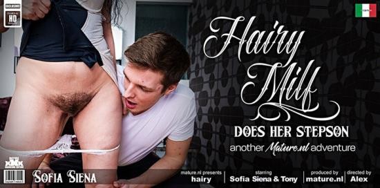 Mature.nl / Mature.eu - Sofia Siena - EU - 49 & Tony Milak - 23 - Toyboy gets seduced by his horny hairy MILF stepmom Sofia Siena into a great fuck adventure (Full HD/1080p/1.3 GB)